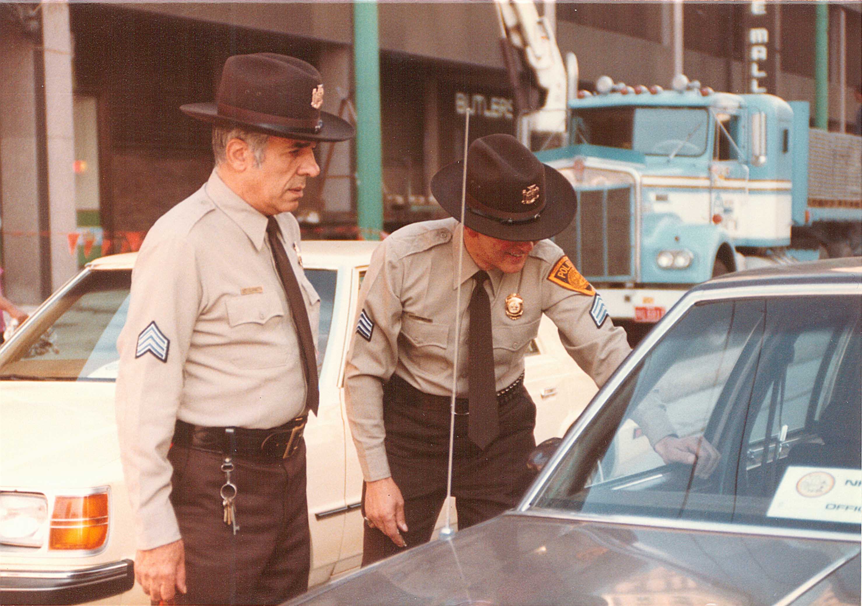 Transit Police officer is speaking with the a driver